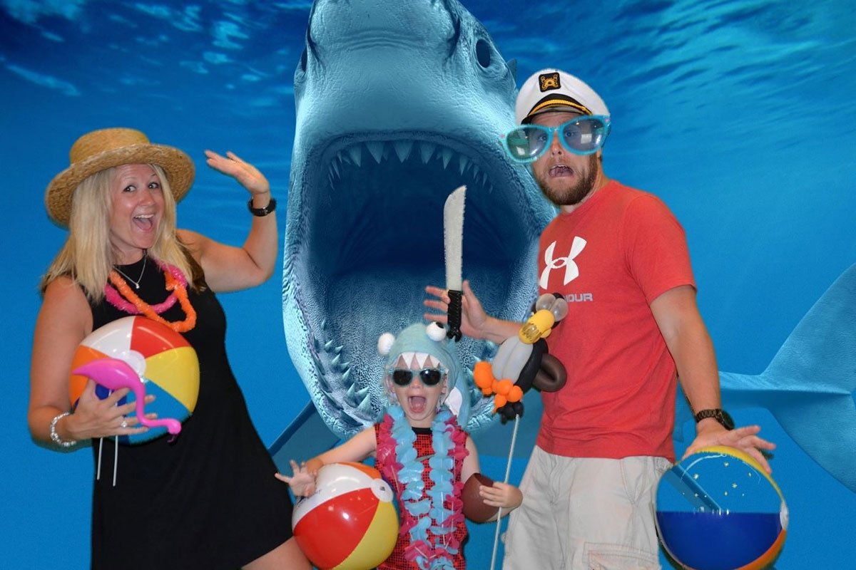 A family photo that is shark themed.